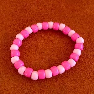 Light pink and hot pink bracelet with stretchy cord